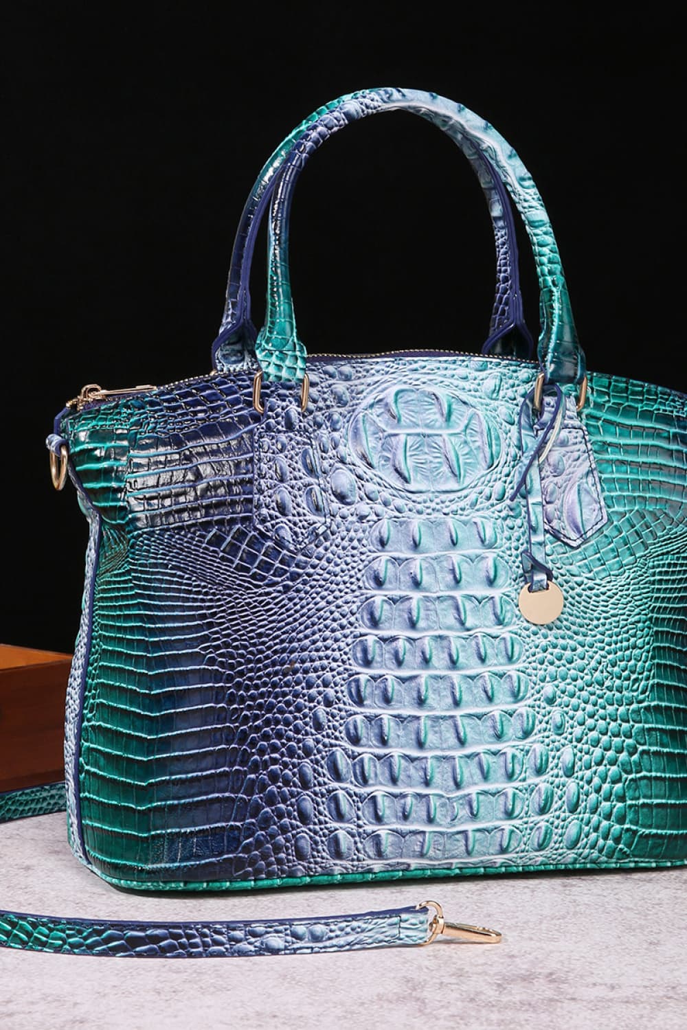 PU leather croc handbag with teal-blue gradient, top handles, zipper pocket