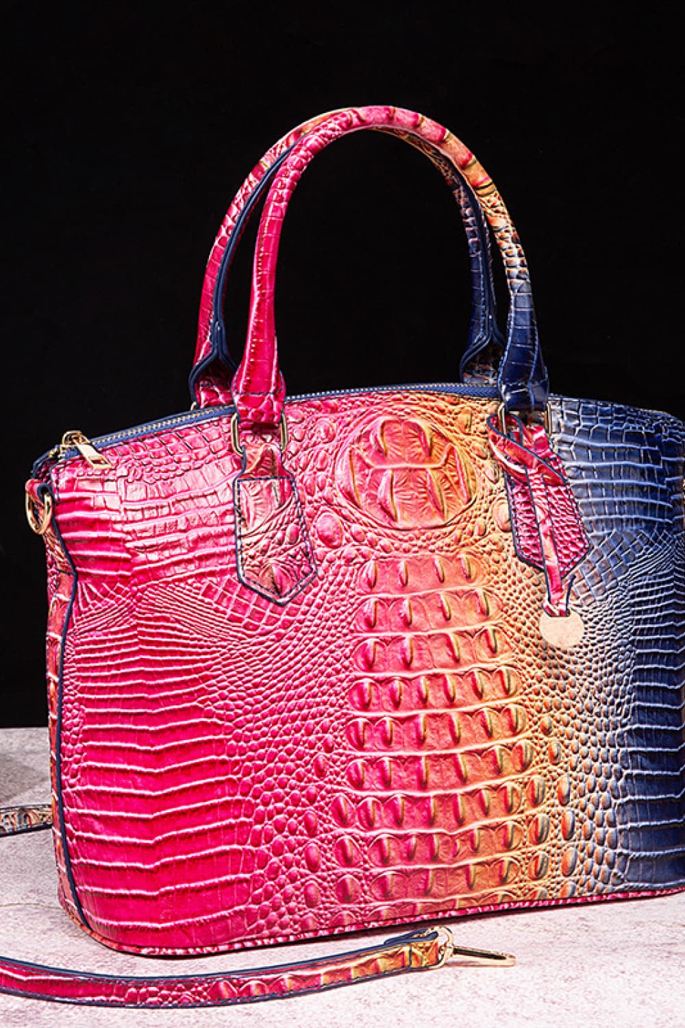 Croc-embossed PU leather handbag with dual top handles, pink and dark blue gradient.