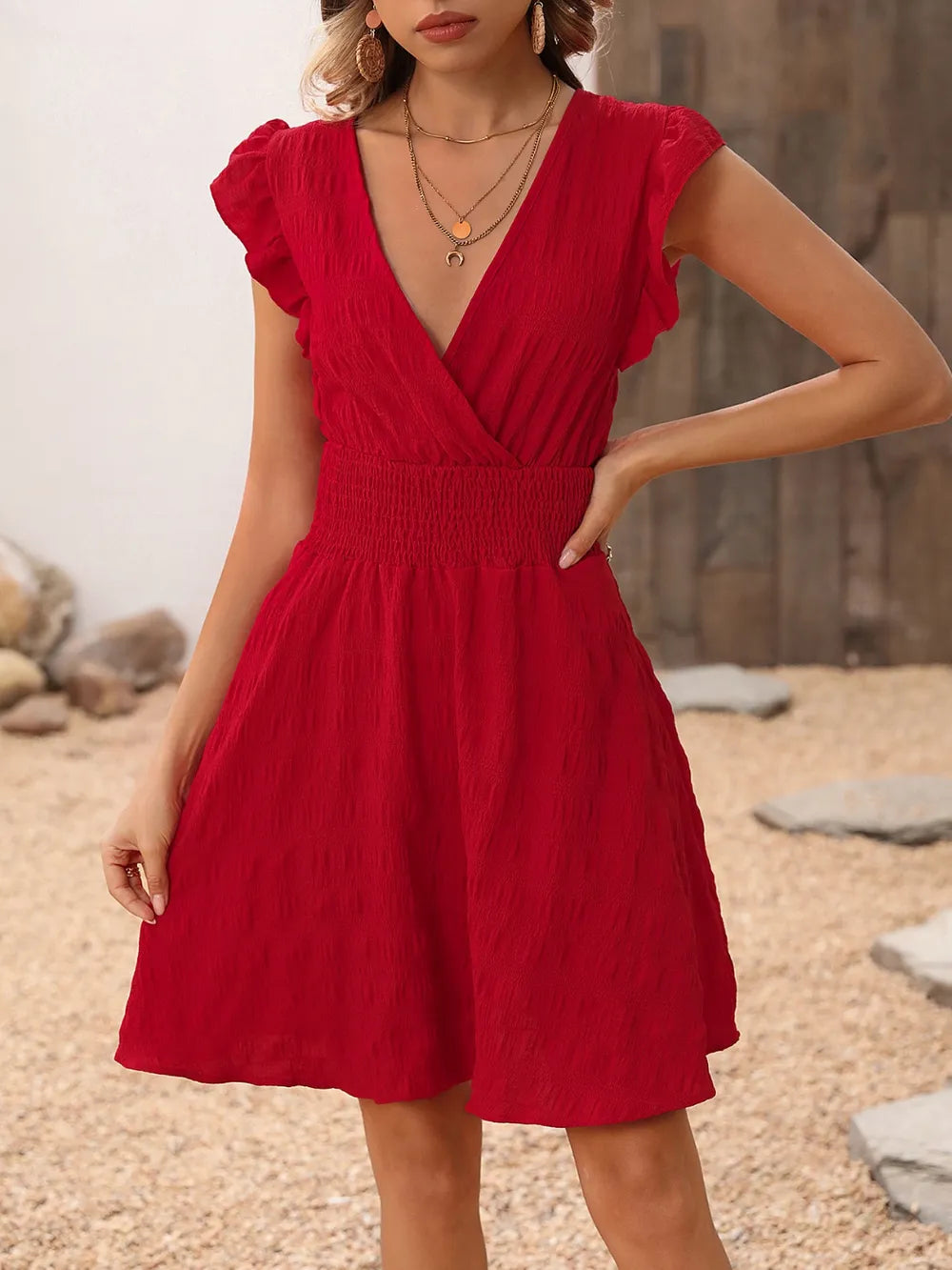 Smocked Ruffled Surplice Mini Dress - Maria de Fatima Andrade